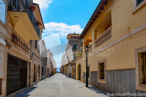 Image of Typical old town in Mallorca with a narrow street. Petra. Balearic Islands Spain.