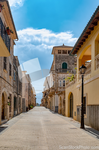 Image of Typical old town in Mallorca with a narrow street. Petra. Balearic Islands Spain.