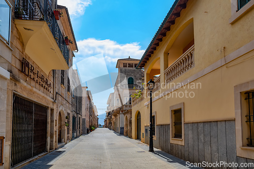 Image of Typical old town in Mallorca with a narrow street. Petra. Balearic Islands Spain.