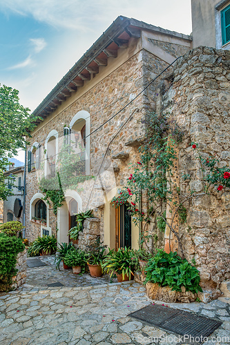 Image of Narrow streets in historic center of town of Vlldemossa, Balearic Islands Mallorca Spain.