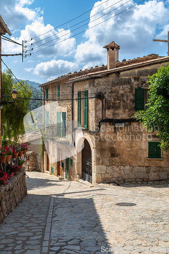 Image of Narrow streets in historic center of town of Valldemossa, Balearic Islands Mallorca Spain.