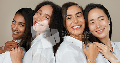 Image of Women, group skincare and beauty with love, hug and support in diversity and inclusion on brown studio background. Friends, model or people smile together and kiss in dermatology, skin care or makeup