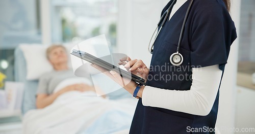 Image of Healthcare check, hands and a doctor with a tablet for a report on a patient at a hospital. Consulting, typing and a nurse with technology and a woman for medical information, results or monitor