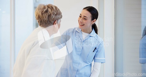 Image of Hospital, talking and senior woman with nurse for medical care, hospice service and support. Healthcare, nursing home and female health worker with elderly patient for conversation, help and empathy