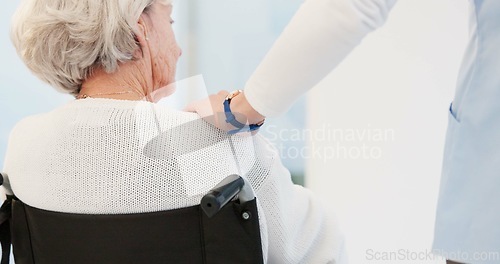 Image of Hand, shoulder and wheelchair with a senior woman in a nursing home for trust, wellness or empathy. Back, comfort or care with an elderly female patient with a disability feeling support from a nurse