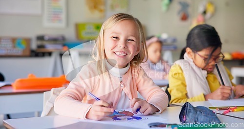 Image of Smile, writing and study with girl in classroom for learning, knowledge and education. Scholarship, happy and future with portrait of young student at school for academy, exam test and project