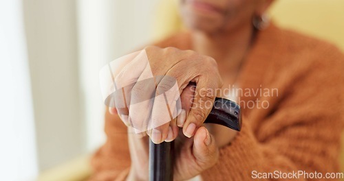 Image of Hands, walking stick and senior woman with a disability, dementia or Alzheimer in a nursing home for senior care. Crutch, balance and old lady with osteoarthritis, Parkinson or osteoporosis or stroke