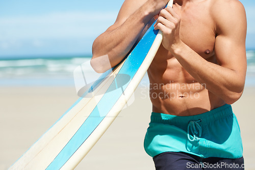 Image of Surfboard, sports body and beach person for surfing fitness, outdoor training or tropical island workout. Closeup abs muscle, ocean sea sand or strong surfer exercise, cardio or relax summer wellness