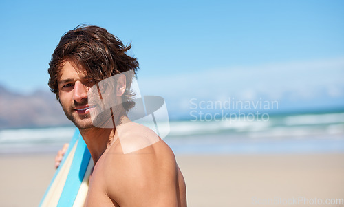 Image of Beach portrait, surf and sports man on holiday, vacation or Spain getaway for nature, freedom or natural outdoor wellness. Surfboard, summer sunshine and face of relax surfer with coast mockup space