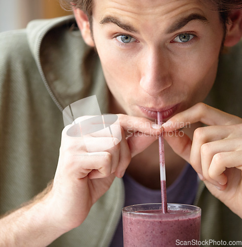 Image of Man, closeup and health smoothie for breakfast fruit drink, morning fibre or healthy detox choice. Male person, portrait and straw for diet liquid shake organic taste, vegan or nutrition raw vitamin