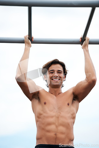 Image of Pull up bar, happiness and man exercise for muscle building, bodybuilder performance or outdoor strength development. Fitness, sports training and athlete happy for workout, challenge or practice