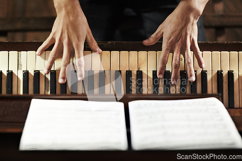 Image of Paper, hands or artist with piano for music, performance or learning solo for entertainment or sound. Pianist closeup, man or creative musician playing jazz keys or notes on organ in top view