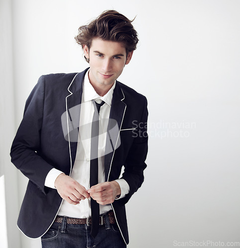 Image of Fashion, smile and portrait of man in a studio with formal, classy and elegant outfit for confidence. Handsome, blazer and young male model with trendy and cool style isolated by white background.