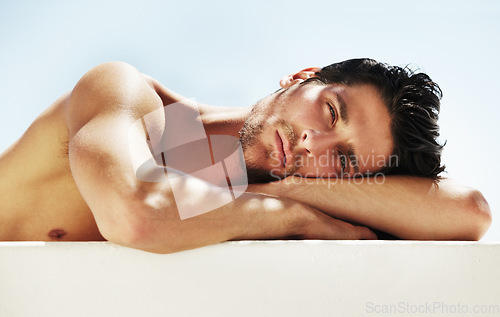 Image of Handsome man, portrait and face in relax for beauty, skincare or vitamin D from the sun. Attractive male person or model relaxing or lying for spa treatment, health and wellness on mockup space