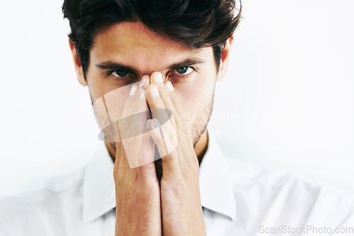 Image of Portrait, sick and man covering nose, allergies or disease, cold or fever in studio isolated on a white background. Face, hands and business professional with flu, allergy or virus and bacteria