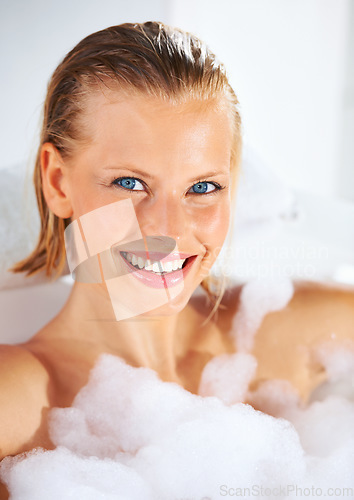 Image of Happy, woman and morning bubble bath portrait with cleaning, skincare and shampoo treatment. Wellness, girl and smile of a female person with soap in bathroom for hair wash and relax with foam