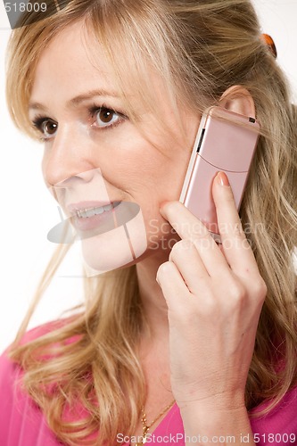 Image of Woman talking on cell phone