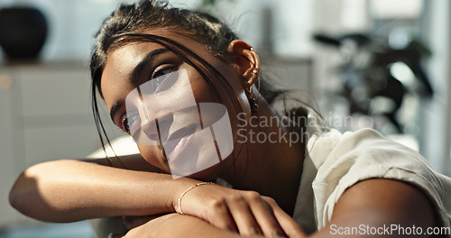 Image of Thinking, depression and young woman on a sofa relaxing with a memory or reflection in living room. Mental health, planning and Indian female person with doubt chilling in lounge of modern apartment.