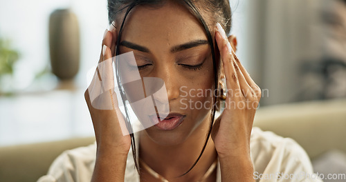 Image of Face, woman and stress in home for headache, anxiety and breathing for mental health, fatigue and mistake. Pain, depression and frustrated indian person with trauma, burnout and confused for crisis