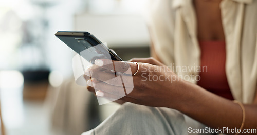 Image of Woman, hands and typing on smartphone in home, reading social network notification and update multimedia subscription. Closeup, app and download mobile games, scroll on internet and chat to contact