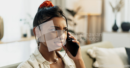 Image of Phone call, communication and young woman on a sofa for relaxing in living room of apartment. Fight, argument and Indian female person on mobile conversation with cellphone in lounge of modern home.