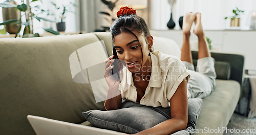 Image of Remote work, phone call woman on a sofa with laptop, conversation or break at home. Smartphone, app and female with contact, communication and checking email, review or feedback in a living room