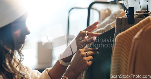 Image of Designer, woman or choice on clothing rack in retail shop or small business for sample or collection. Creative stylist, customer and search or decision for design, fabric or fashion clothes in store