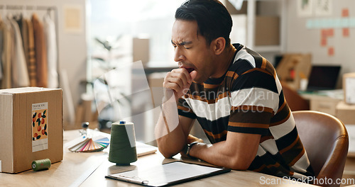 Image of Fatigue, man and yawning with shipping company, delivery worker at desk with brain fog, small business and clipboard. Overworked, overtime and burnout with inventory or product checklist and tired