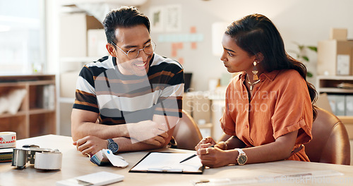 Image of Small business, office and woman training an employee with logistics, checklist and planning a schedule. Working, strategy and people with inventory, paperwork and learning hr rules of workplace