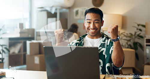 Image of Business man, winner and boxes or computer for logistics celebration, startup success and e commerce profit. Entrepreneur, seller or Asian supplier with package, courier news or winning on his laptop