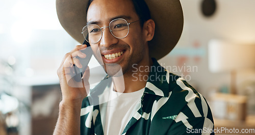 Image of Thinking, talking and man on phone call in retail for networking, orders and planning stock. Happy, idea and an Asian employee in fashion with conversation about a sale at a boutique or shop online