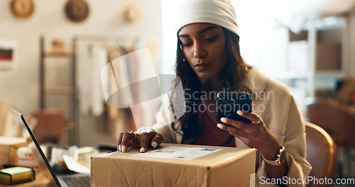 Image of Woman, box and phone in logistics for inventory or storage inspection at fashion or clothing boutique. Female person or small business owner checking boxes for pricing with mobile smartphone at store