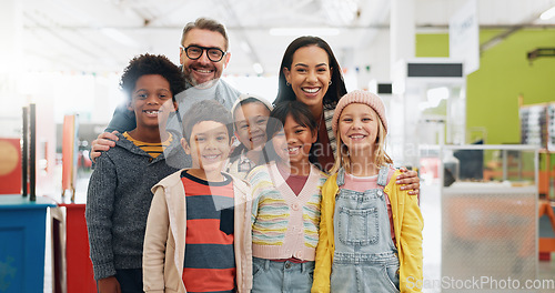 Image of Science, portrait and group of children with teachers at convention, expo or exhibition with happiness. Man, kids and face with smile at tradeshow or scientific conference for knowledge and education