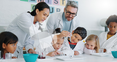 Image of Science, experiment and students in class with their teachers for learning or to study chemistry. Children, school and education with kids in a laboratory for discovery of a chemical reaction