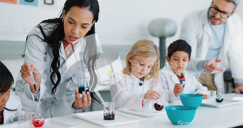 Image of School kids, science and class with teacher, lab and learning information with experiment for knowledge. Children, boy and girl with education, scientist or scholarship for innovation in laboratory