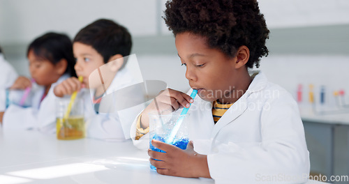 Image of Education, science and kids in a classroom for an experiment while learning chemistry together at school. Study, laboratory and innovation with student children in class for growth or development