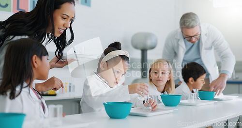 Image of Science, chemistry and children in class with their teachers for learning or to study. Students, school and scholarship with kids in a laboratory for an experiment of chemical reaction for education