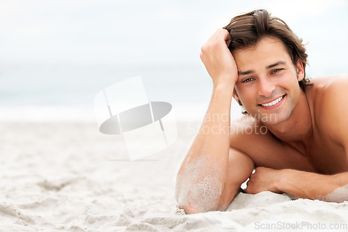 Image of Man, smile and portrait beach sand or relax summer holiday, vacation fun or sea calm. Male person, happy and peace at ocean for fresh air tourism or travel destination, confident or tropical sunshine