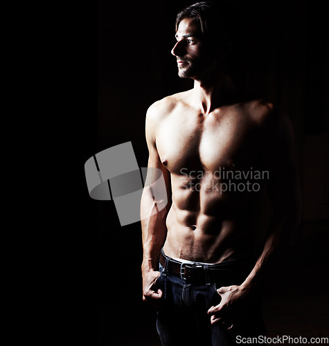 Image of Body muscle, thinking and strong man with abs in studio isolated on a black background mockup space. Sexy, bodybuilder and serious athlete workout, training or exercise for power, fitness and health