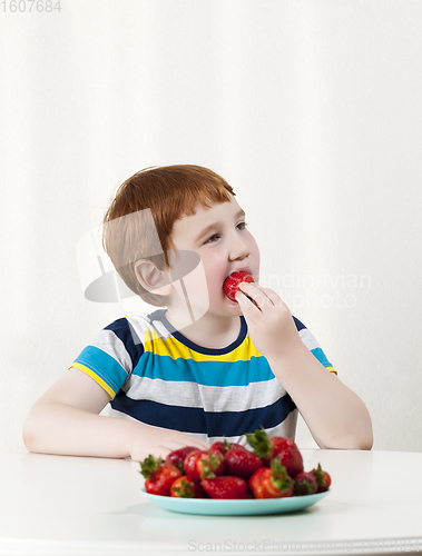 Image of a cute boy with red hair