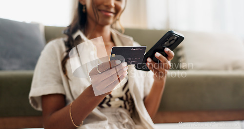 Image of Happy woman, hands and phone with credit card for payment, online shopping or transaction in living room at home. Closeup of female person or shopper on mobile smartphone with debit for ecommerce