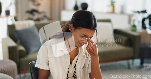 Image of Woman, pain and headache in living room for stress, mental health or anxiety of fatigue, frustrated crisis or depression. Tired indian girl with eye strain from burnout, vertigo and brain fog at home