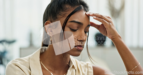 Image of Face, woman and headache in home of pain, mental health and anxiety of debt, challenge or mistake. Stress, tired and upset with indian girl with trauma, broken heart or frustrated with fatigue