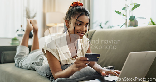 Image of Credit Card, laptop and happy woman typing online shopping password, code or web search for ecommerce discount deal. Digital money exchange, easy sales payment or omnichannel customer banking at home