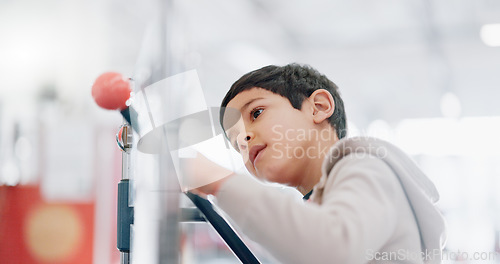 Image of Playing, education and a child in a lab for science, atom research and studying molecules. Thinking, future and a boy, kid or student learning about dna in a classroom or development in a workshop