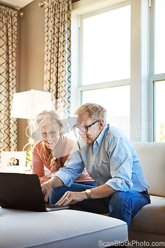 Image of Laptop, happiness or mature couple in home typing for savings, property investment or online shopping together. Ecommerce, website or senior people planning for investing or research on pc on sofa