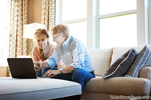 Image of Laptop, smile or mature couple in home typing for savings, property investment or online shopping together. Finance, website or happy senior people planning for investing or research on pc on sofa
