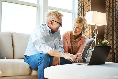 Image of Laptop, conversation or mature couple in home typing for savings, planning or online shopping together. Ecommerce, email or happy senior people on pc for internet research in living room on sofa