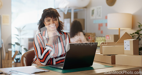 Image of Small business, portrait and happy woman with laptop in office for logistics, sales or ecommerce. Supply chain, face and female store owner online for communication, cargo or retail stock procurement