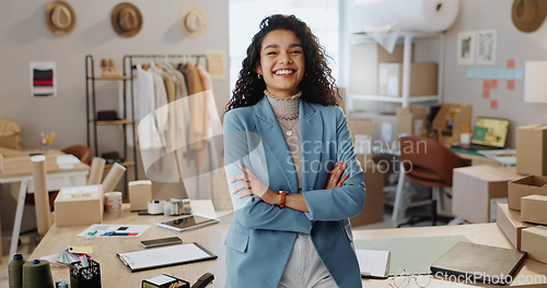 Image of Businesswoman, confident and smile in office for logistics, warehouse or distribution startup in fashion. Portrait, female designer or happy with customer purchase for shipping, e commerce or retail